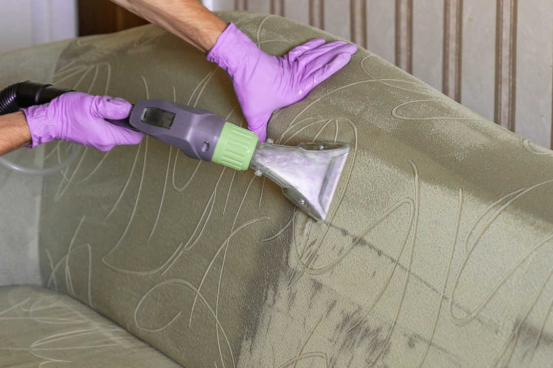 Closeup of upholstered Sofa chemical cleaning