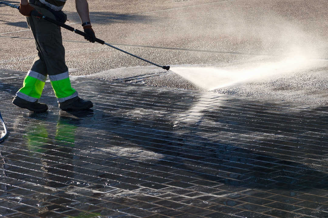 Wet cleaning of street.