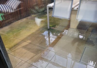 outdoor entertaining area, dirty outdoor paved area