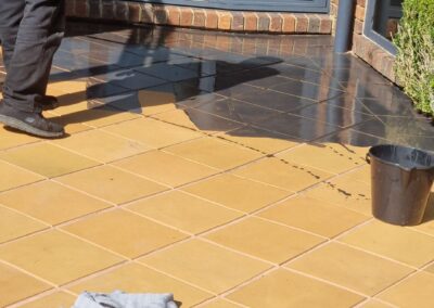pavers cleaned and epoxy flooring installation in progress
