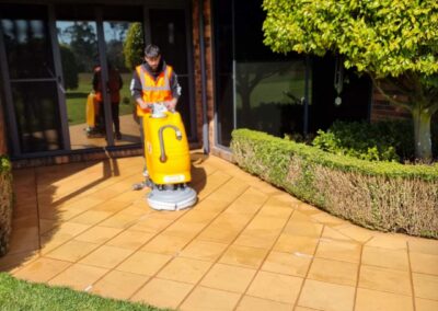 paver clean and paint cleaning paved area outside before epoxy flooring installation